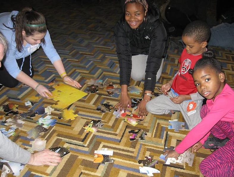 solving a jigsaw puzzle together